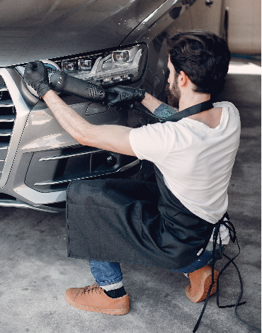 polish a car in a garage